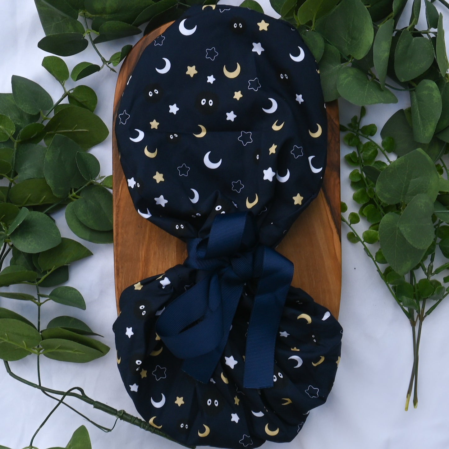 SOOT SPRITES DARK BLUE MOON AND STARS SATIN LINED PONYTAIL SCRUB CAP